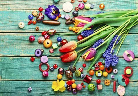 Assorted of colored beads,wooden table Stock Photos