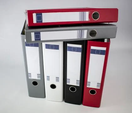Assorted colored document file cabinets for office Stock Photos