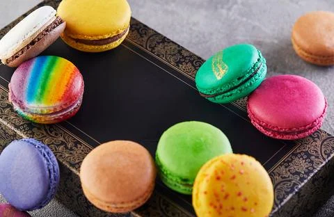Assorted Colorful Macarons on Decorative Box Stock Photos