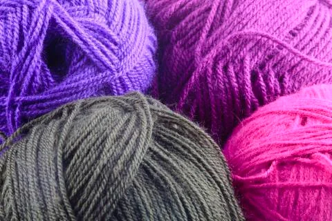 Assorted Colors of Rolled Yarn Stock Photos