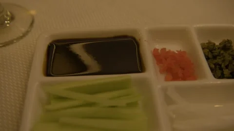 Assorted Condiments and Fresh Vegetables Served in Divided Dish at Beijing Stock Footage 345783371