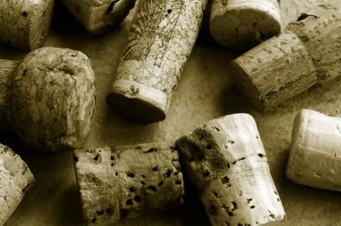 Assorted corks on textured surface closeup Stock Photos