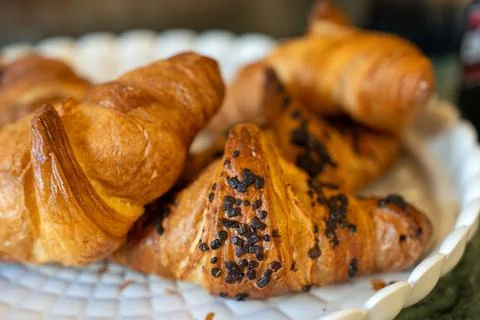 Assorted cornetti displayed for breakfast with crispy layers and gourmet pr.. Stock Photos