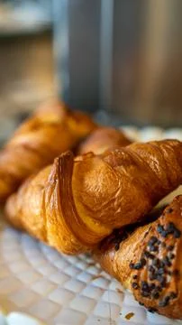 Assorted cornetti displayed for breakfast with crispy layers and gourmet pr.. Stock Photos