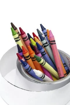 Assorted crayon inside a masking tape Stock Photos