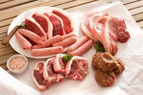 Assorted cuts of raw meat Stock Photos