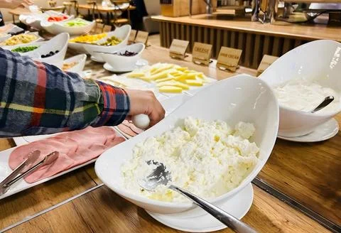 Assorted Dairy Products and Cold Cuts on Buffet Table Stock-Fotos