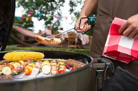 Assorted delicious grilled meat with vegetable on a barbecue Stock Photos