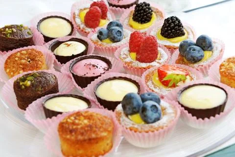 Assorted delicious looking cupcakes Stock Photos