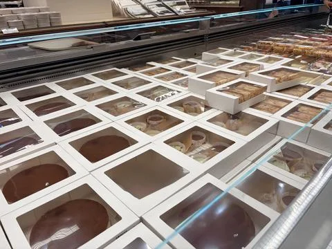 Assorted Desserts in a Bakery Display Case Stock Photos