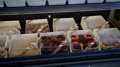 Assorted Desserts in Gift Boxes on Display Stock Footage 301529384