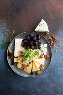 Assorted different cheeses in a plate Stock Photos
