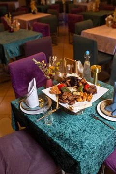 Assorted different kebabs on a white plate in a restaurant Foto stock