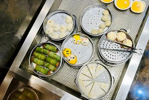 Assorted Dim Sum in Bamboo Steamer Baskets 스톡 사진