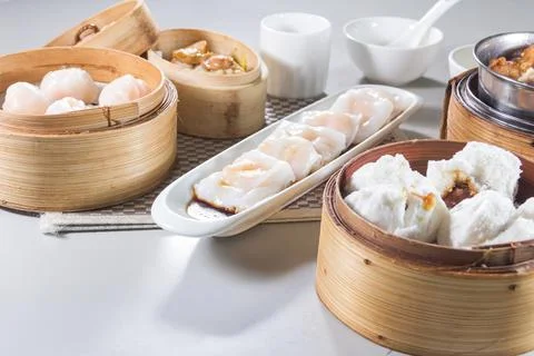 Assorted Dim Sum Platter with Bamboo Steamers Stock Photos