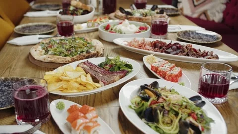 Assorted Dishes on Festive Dining Table Stock Footage 302088170