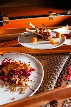 Assorted dishes on the piano Stock Photos