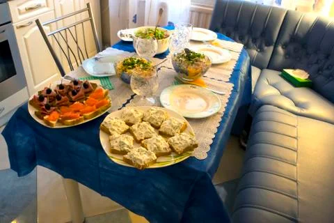 Assorted dishes on served table Stock Photos