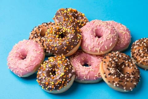 Assorted donuts on a blue background Foto stock