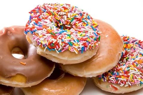 Assorted Doughnuts An assortment of fresh and delicious doughnuts Copyrigh... Stock Photos