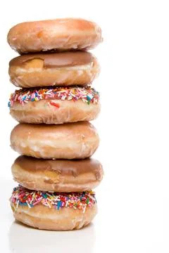 Assorted Doughnuts An assortment of fresh and delicious doughnuts Copyrigh... Stock Photos