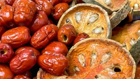 Assorted dried bael and Chinese dates Stock Photos