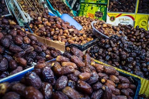 Assorted dried dates displayed in bulk at traditional market stall in Fnide.. Stock Photos