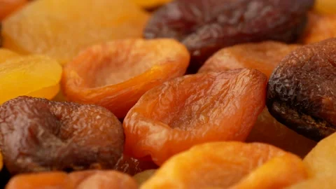 Assorted dried fruits, side view. Dried apricots without seeds - background. Stock Footage 144685337