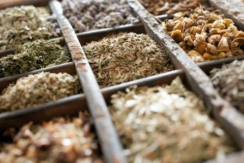 Assorted dried herbs in a printers tray Stock Photos