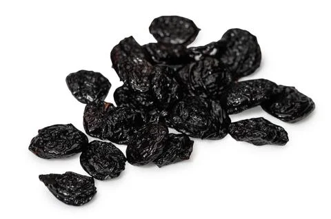 Assorted dried prunes layout on white background Stock Photos