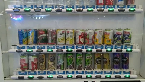 Assorted drinks in a vending machine  Stock Footage 100097771