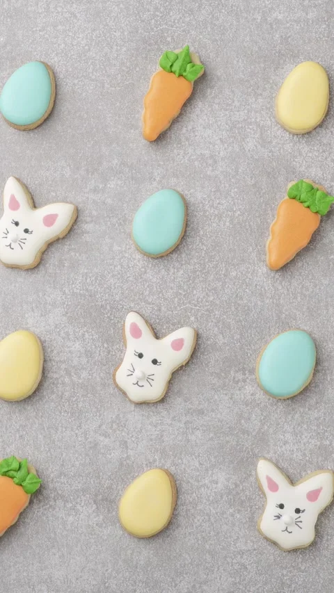 Assorted easter cookies over grey concrete background Stock Footage 328646690