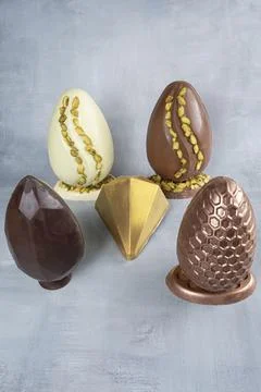 Assorted Easter eggs with pistachios, milk and dark chocolate 2. Stock Photos