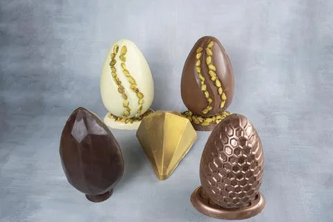 Assorted Easter eggs with pistachios, milk and dark chocolate 1. Stock Photos