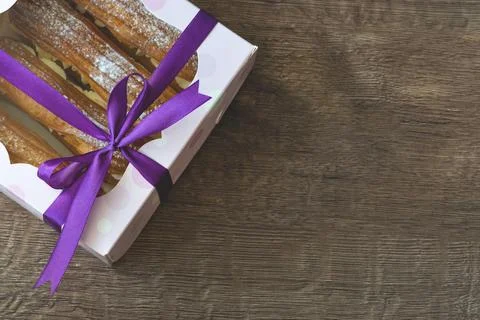 Assorted Eclairs in Box with Large Copy Space 库存照片