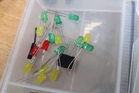 Assorted Electronic Components and Colorful LED Diodes Inside Storage Box 스톡 사진