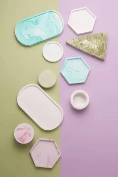 Assorted empty soap dishes and containers on pastel background Stock Photos