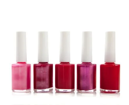 Assorted fingernail polish on a white background with copy space Stock Photos