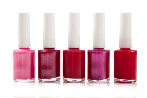 Assorted fingernail polish on a white background Stock Photos