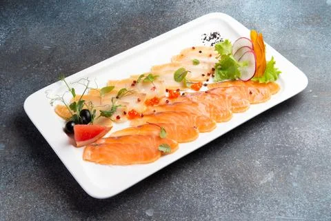 Assorted fish slices in a plate. Foto stock