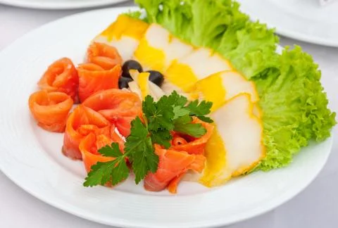 Assorted fish slices with salad Stock Photos