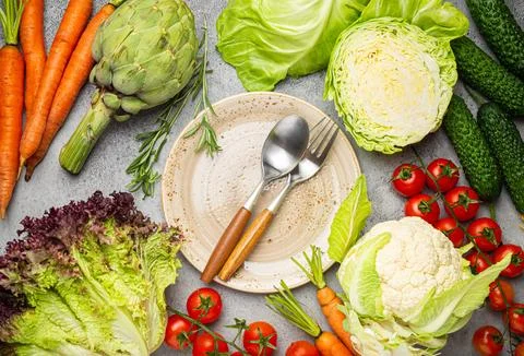 Assorted food raw products: vegetables, beef meat, fish salmon and empty plate Stock Photos