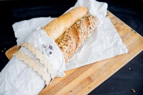 Assorted fragrant loaves of bread with flour Stock Photos