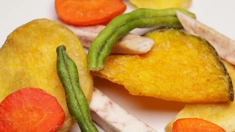 Assorted freeze-dried vegetables, rotation in circle. zucchini, radish, gre.. Stock Footage 318674957