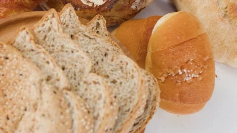 Assorted Fresh Bakery Bread and Sliced Whole Grain Toast Stock Footage 338052063