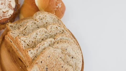 Assorted Fresh Bakery Bread and Sliced Whole Grain Toast Stock Footage 338054841