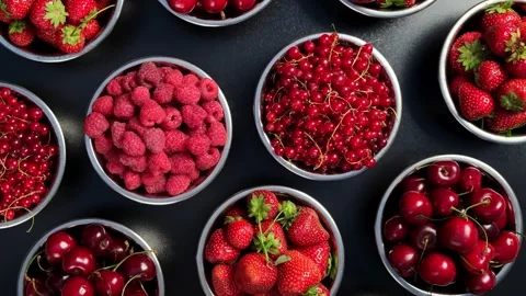 Assorted Fresh Berries And Cherries In Round Bowls Overhead View Stock Footage 343280321