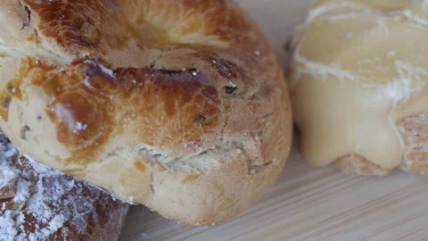 Assorted fresh biscuits with sugar glaze and almonds coating arranged on a Stock Footage 341509116
