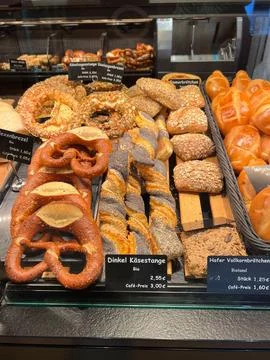 Assorted Fresh Breads in Bakery Stock Photos