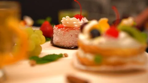 Assorted fresh cream and fruit pastries Video stock 94092830